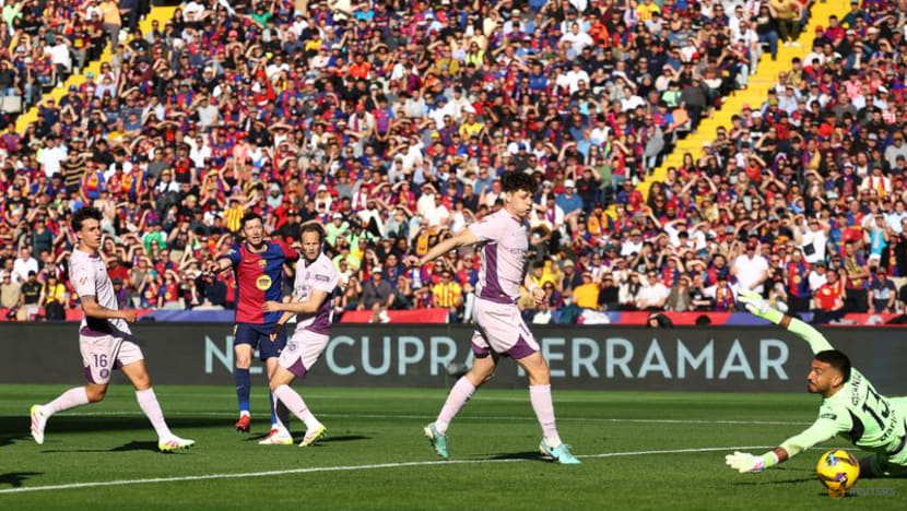 Lewandowski strikes twice as Barcelona beat Girona to take LaLiga lead