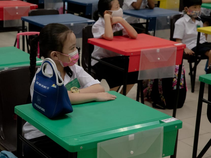 A Primary 1 pupil on her first day of school at Waterway Primary School on Jan 4, 2021.