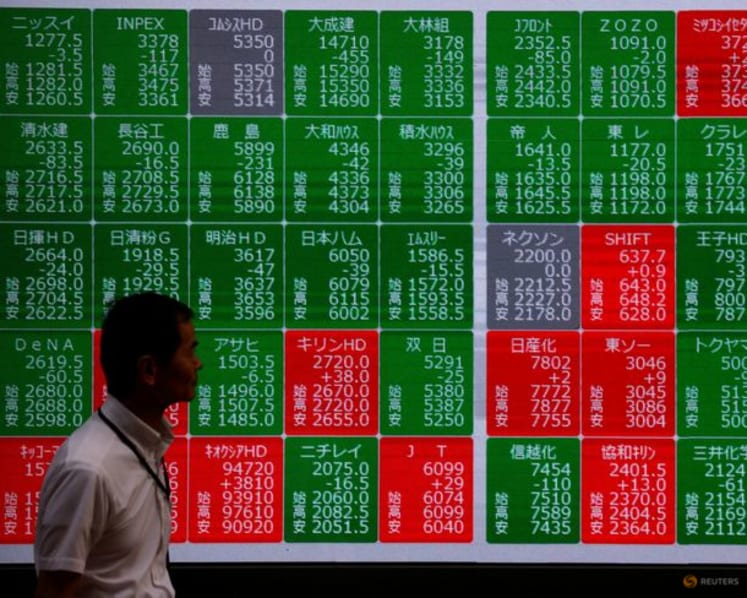 Asian stocks mostly down with tech firms back under pressure