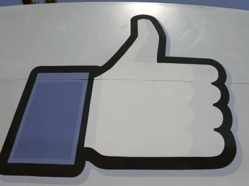 This June 11, 2014 file photo shows Facebook's "like" symbol at the entrance to the company's campus in Menlo Park, California. Photo: AP This June 11, 2014 file photo shows Facebook's "like" symbol at the entrance to the company's campus in Menlo Park, California. Photo: AP