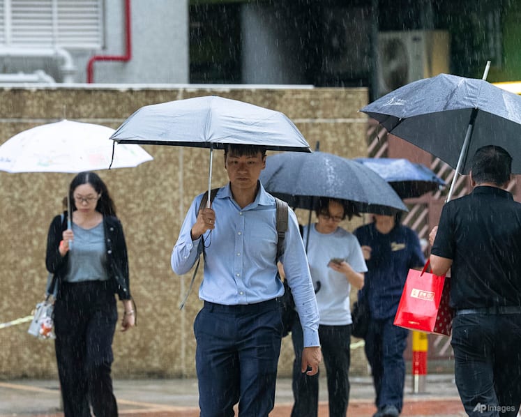 Hong Kong hoists highest rain signal, closes schools