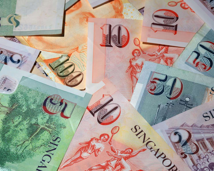S$400,000 in seized cash confiscated from money courier who didn't declare S$3m when entering Singapore on 2 trips