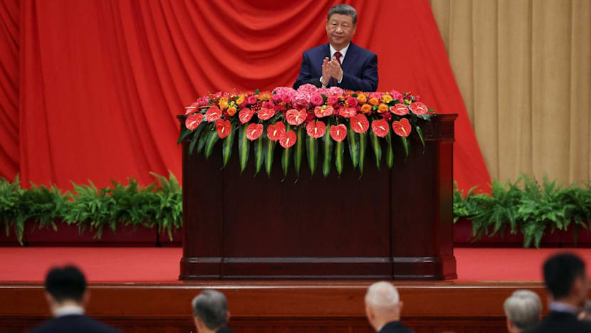 Marking China's national day, Xi calls for progress towards reunification with Taiwan