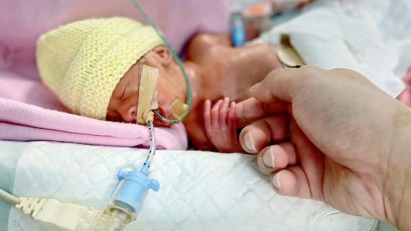 Premature baby ‘size of a palm’ home after 400 days in KKH, parents learn to rise above heartache 