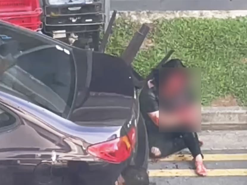 The scene along Beach Road where Ms Han Hongli, 42, was allegedly attacked by her husband with a chopper.