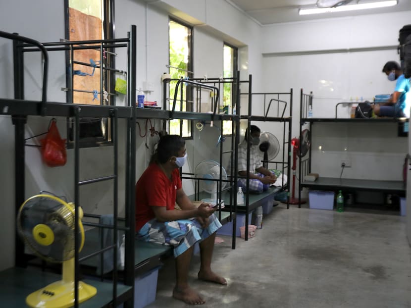 Foreign workers in their room at Westlite Papan dormitory on April 21, 2020. The room has three occupants now, down from eight, after workers in essential services were moved out. Foreign workers in their room at Westlite Papan dormitory on April 21, 2020. The room has three occupants now, down from eight, after workers in essential services were moved out.