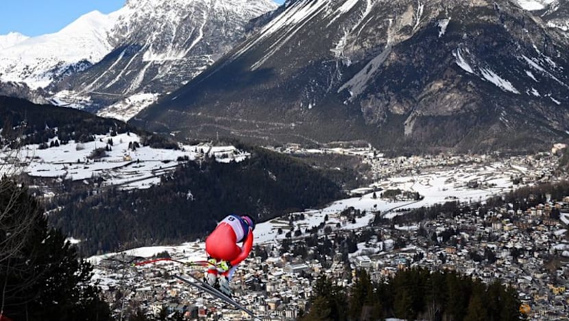 Alpine skiing-Von Allmen strikes gold again with more than a little help from his friend