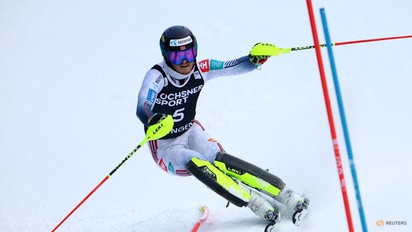 Alpine skiing-McGrath goes top of World Cup slalom standings with Wengen victory
