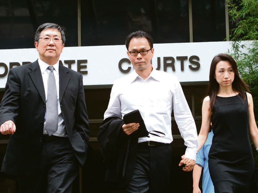 Ng Boon Gay, his wife and his lawyer leaving court yesterday. Photo by OOI BOON KEONG