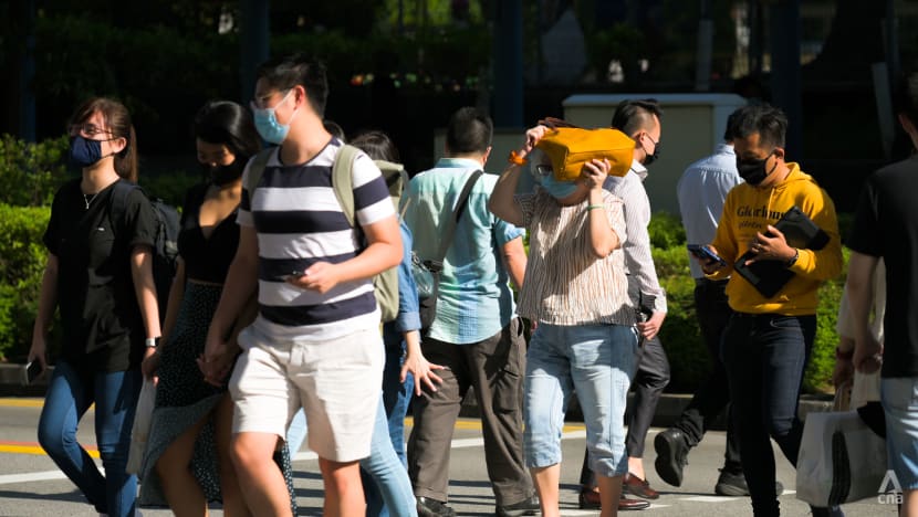 Singapore reports a record 1,939 new COVID-19 cases, 2 more deaths