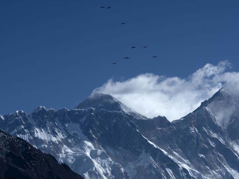 Virus reaches Everest as climber tests positive