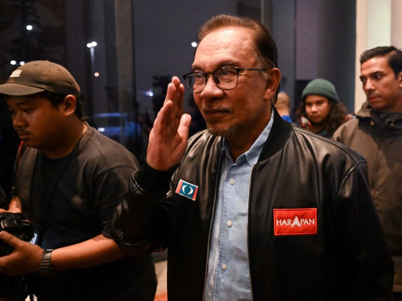 Pakatan Harapan chairman Anwar Ibrahim (centre) reacts at the end of a press conference in Kuala Lumpur on Nov 20, 2022. Pakatan Harapan chairman Anwar Ibrahim (centre) reacts at the end of a press conference in Kuala Lumpur on Nov 20, 2022.