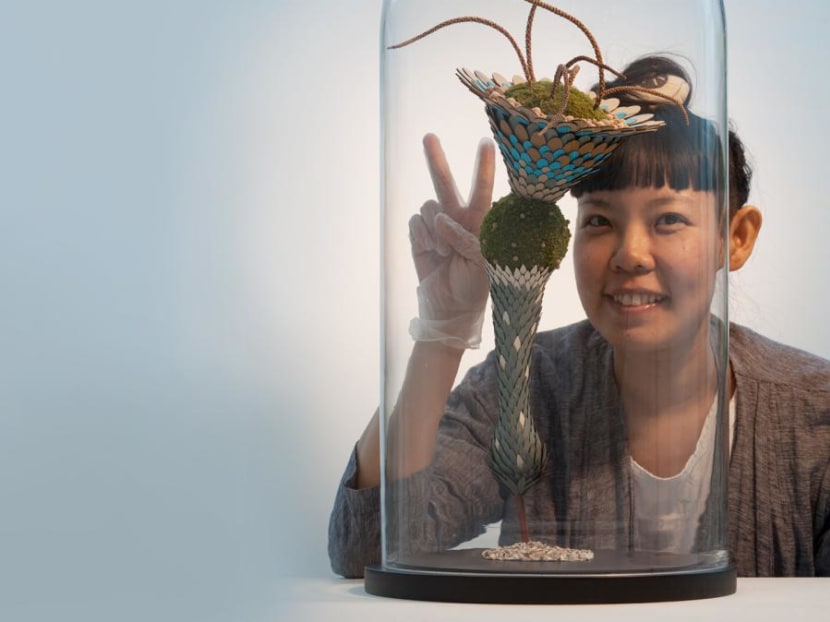 This Malaysian artist makes small floral sculptures that are both beautiful and strange This Malaysian artist makes small floral sculptures that are both beautiful and strange