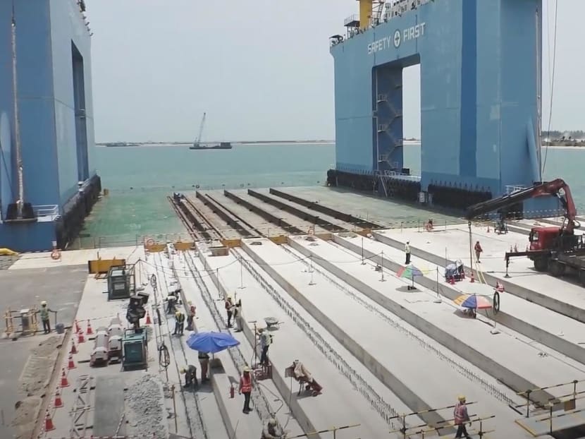 A view of a worksite for Tuas Port that is undergoing its second phase of construction.