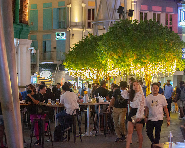 Groups of happy customers pack bars for late-night drinks on first day of relaxed Covid-19 rules 
