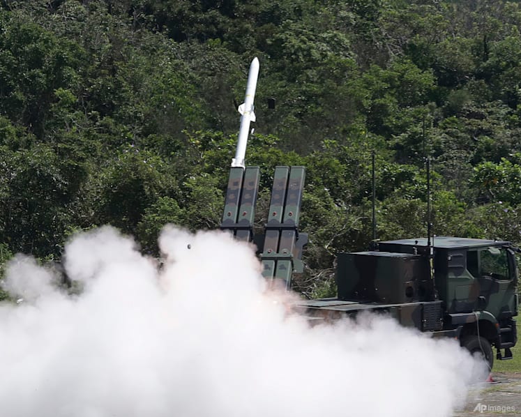 Taiwan president pledges peace with China but says island must strengthen defences