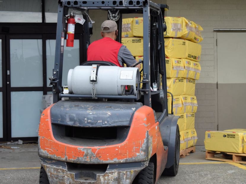 A photo of a forklift operator.