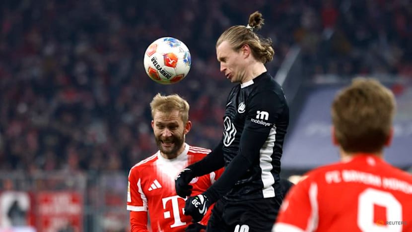 Bayern crush own-goal kings Wolfsburg 8-1 to stretch lead at top