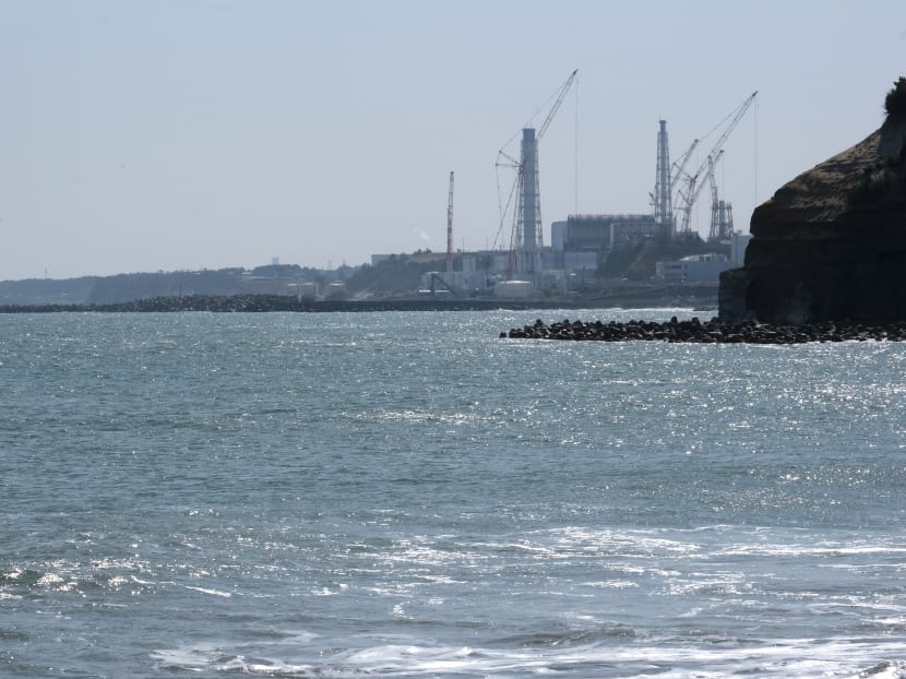 This picture taken on March 10, 2021 of the coast of Futaba town, in Fukushima prefecture, Japan, shows the Tokyo Electric Power Company Holdings Fukushima Daiichi nuclear power plant (top). This picture taken on March 10, 2021 of the coast of Futaba town, in Fukushima prefecture, Japan, shows the Tokyo Electric Power Company Holdings Fukushima Daiichi nuclear power plant (top).