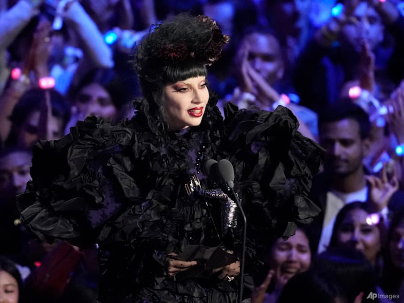 Lady Gaga pauses Sydney concert after dancer falls off stage