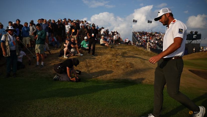 Burns seizes Open lead, DeChambeau shrugs off penalty to stay in the mix