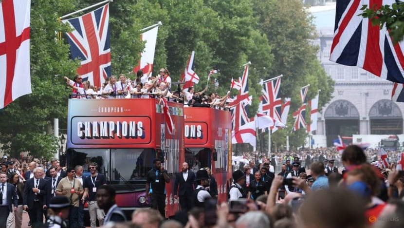 Thousands gather to watch England women mark Euro win with London parade