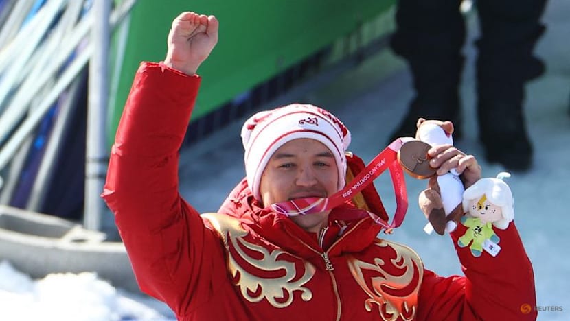 Russian flag returns to Games podium with two downhill bronzes