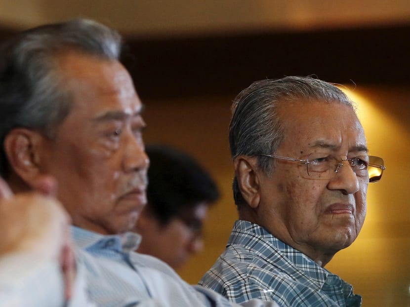 Mr Muhyiddin Yassin (left) and Dr Mahathir Mohamad are seen in Shah Alam in this file picture taken on March 27, 2016. Mr Muhyiddin Yassin (left) and Dr Mahathir Mohamad are seen in Shah Alam in this file picture taken on March 27, 2016.