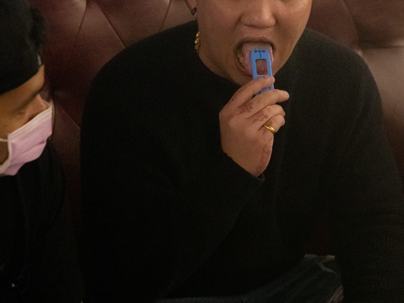 The saliva test being conducted during the operation at nightspots in Orchard Road and Jalan Sultan on March 31 to April 1, 2023. The saliva test being conducted during the operation at nightspots in Orchard Road and Jalan Sultan on March 31 to April 1, 2023.