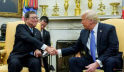 Japan's Ishiba heads to G7 to press Trump to drop auto tariffs