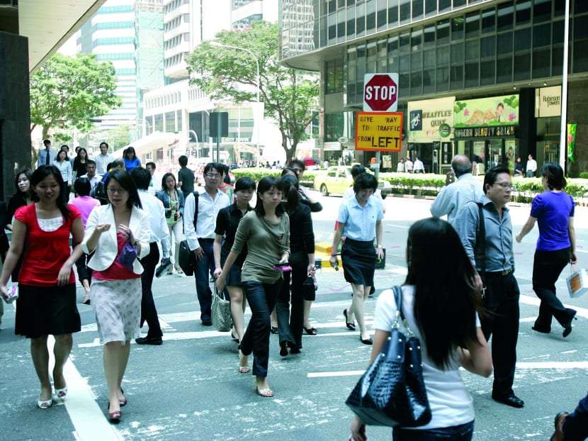 Offering employees the chance to work overseas will motivate Singapore staff better than any other perk, said Ms Stella Tang of Robert Half Singapore. TODAY FILE PHOTO