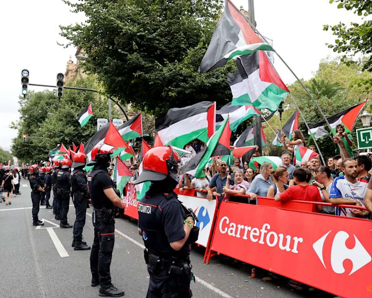 Cyclists urge safety as protests disrupt Vuelta a Espana