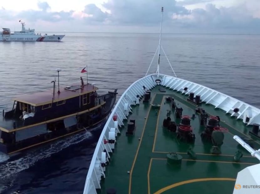 A Philippine flagged boat is blocked by a China Coast Guard vessel during an incident that resulted in a collision between the two vessels, in the disputed waters of the South China Sea in this screen grab obtained from handout video released October 22, 2023. China Coast Guard/Handout via REUTERS A Philippine flagged boat is blocked by a China Coast Guard vessel during an incident that resulted in a collision between the two vessels, in the disputed waters of the South China Sea in this screen grab obtained from handout video released October 22, 2023. China Coast Guard/Handout via REUTERS