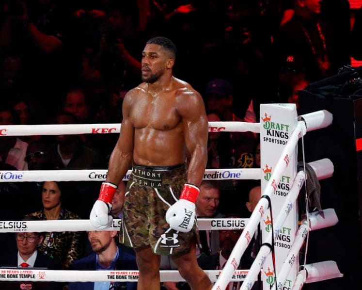 Joshua pays tribute to friends killed in Nigeria crash