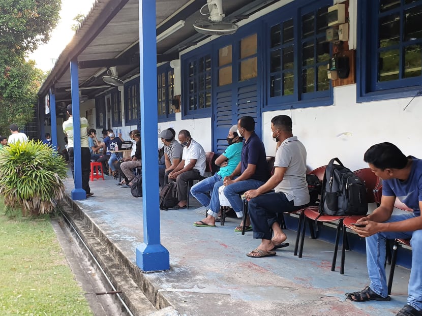 Migrant workers queueing outside the Healthserve clinic in Geylang.