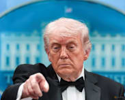 Trump insists China trip will go on as planned; analysts say leaders' summit crucial to manage risks
