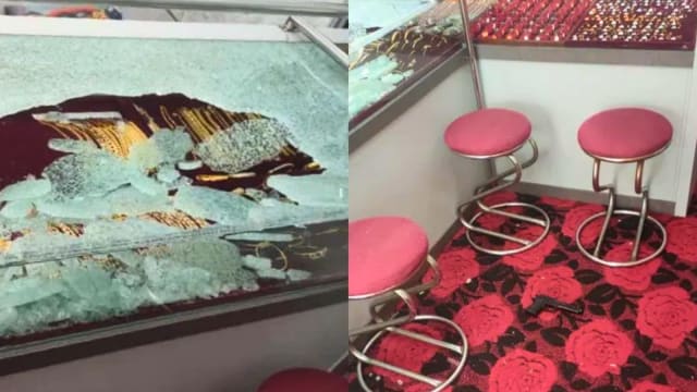 马国蒙面男持玩具枪劫金店  一分钟抢走逾7万元金饰