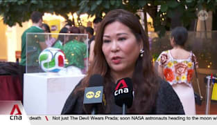 Football fans in Singapore celebrate opener with embassies of host cities