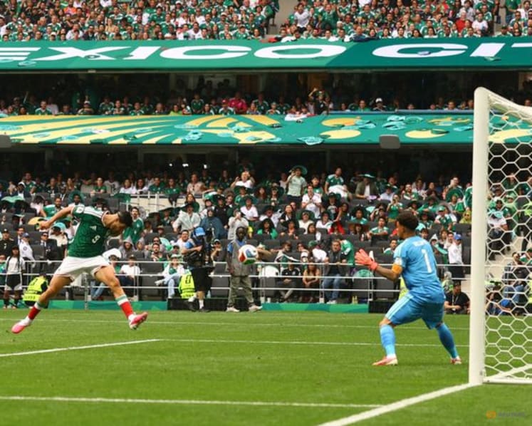 Mexico get World Cup party started with 2-0 win over nine-man South Africa