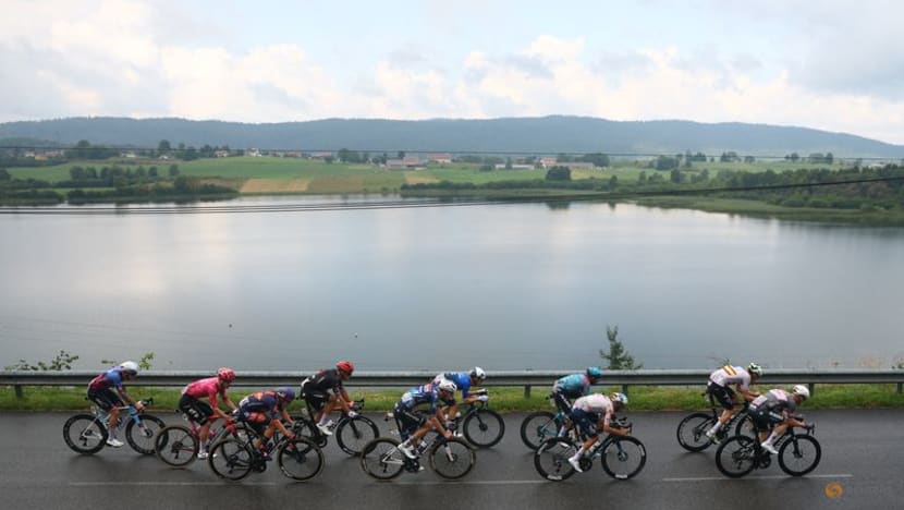 Tour de France final stage neutralised after slippery road conditions