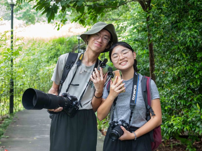 Mr Lumin Ong (left) and Ms Tay Jing Xuan are regular volunteers with NParks’ Dragonfly Watch and photograph dragonflies as a hobby.