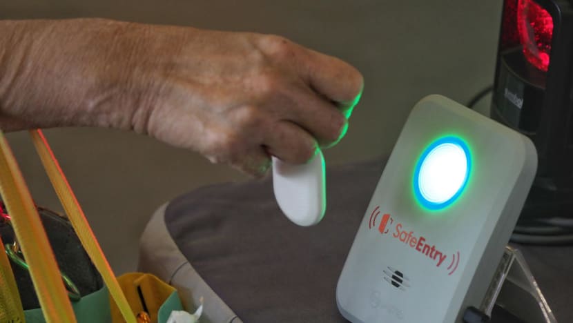 Woman who allegedly used family member's TraceTogether token arrested for cheating