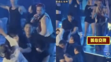 Man Storms On Stage During G-Dragon's Performance In Vietnam - And It Took A Few Dancers & Guards To Stop Him