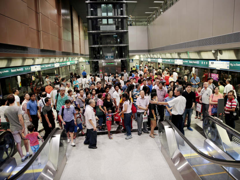 A crowd at Beauty World station, a key draw of the 12-station Downtown Line 2. Photo: Jason Quah/TODAY