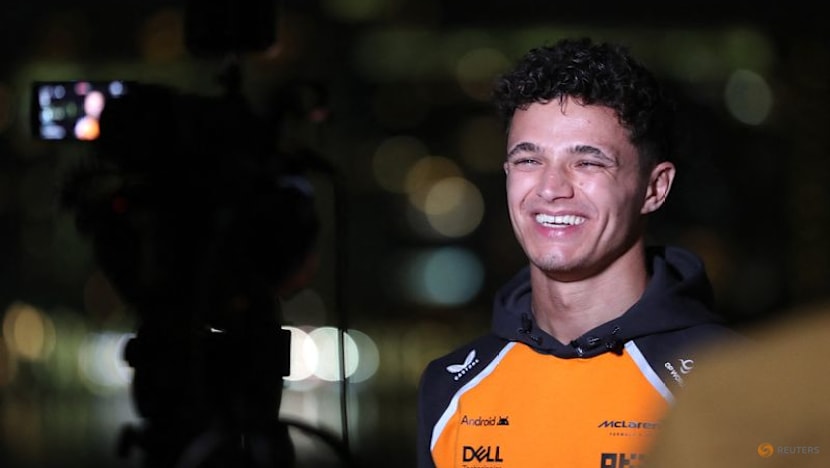 Norris gets his hands on F1 trophy as unwell Verstappen stays away