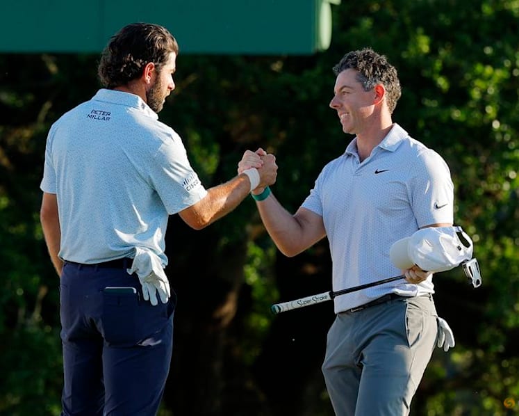 Carefree McIlroy strengthens grip on Masters title defence