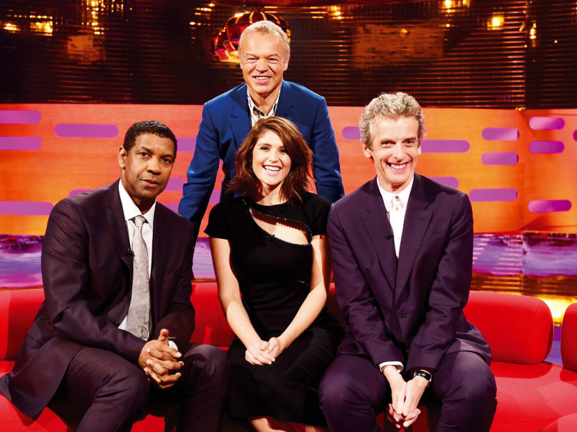 Graham Norton with guests Denzel Washington, Gemma Arteton and Peter Capaldi: ‘No, we don’t always hang 
out together,’ 
says Norton.