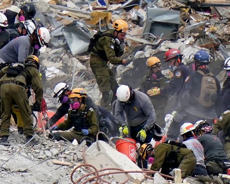 Search in Florida condominium collapse to take weeks; deaths reach 90