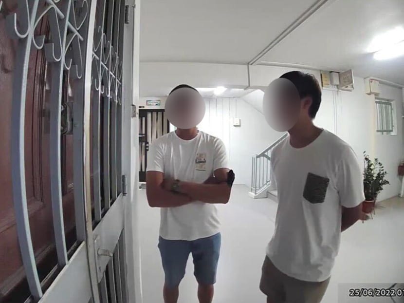 Two men were caught on camera&nbsp;posing as student volunteers soliciting donations from a resident living in Hougang.