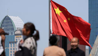 China arrests former senior anti-graft official for suspected bribes
